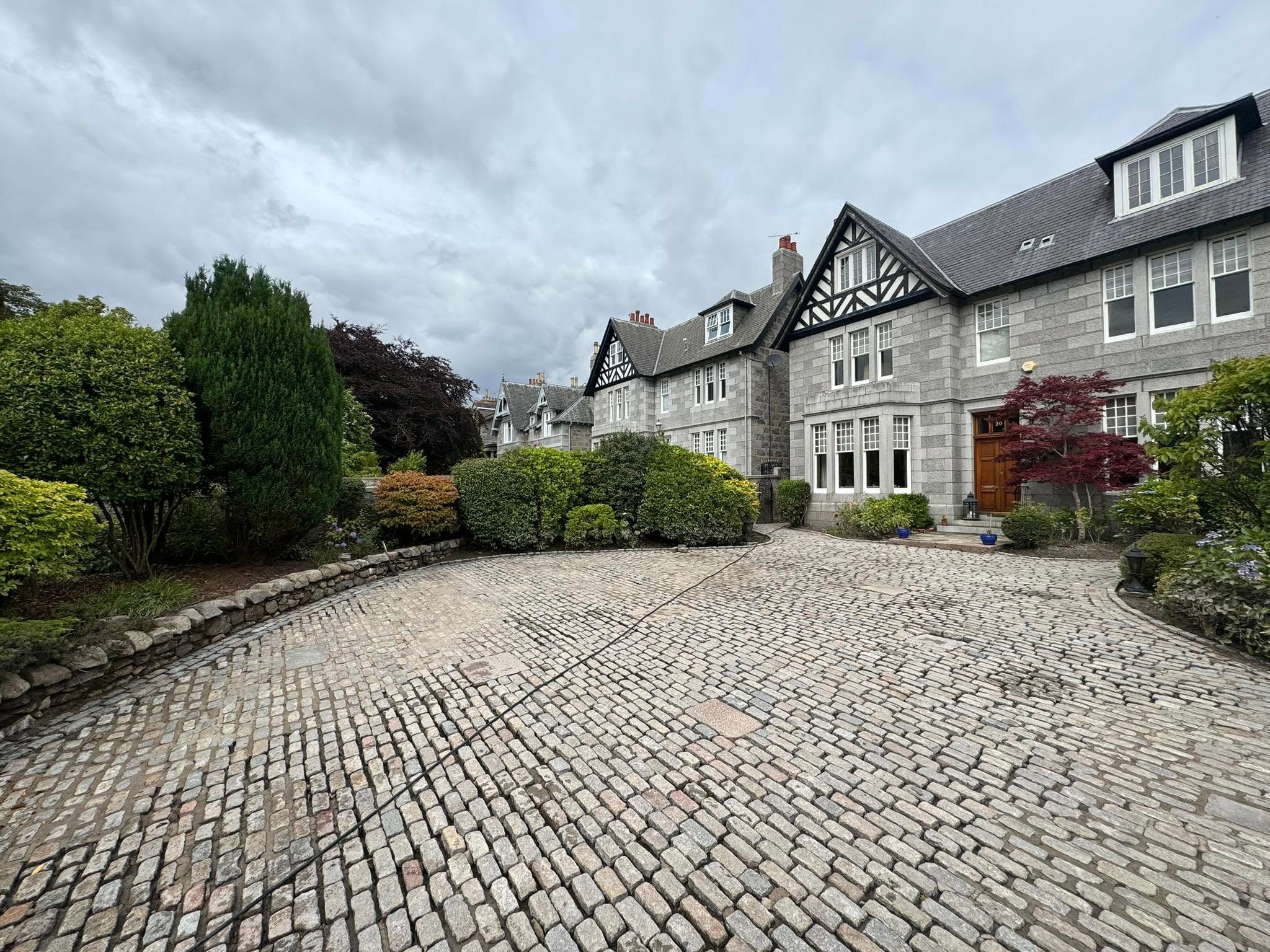 Granite mansion cobbled courtyard after cleaning